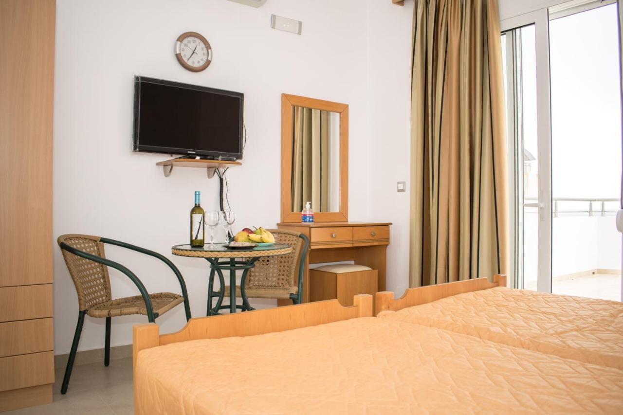 Red Hibiscus Stegna Guest House Archangelos  Bagian luar foto