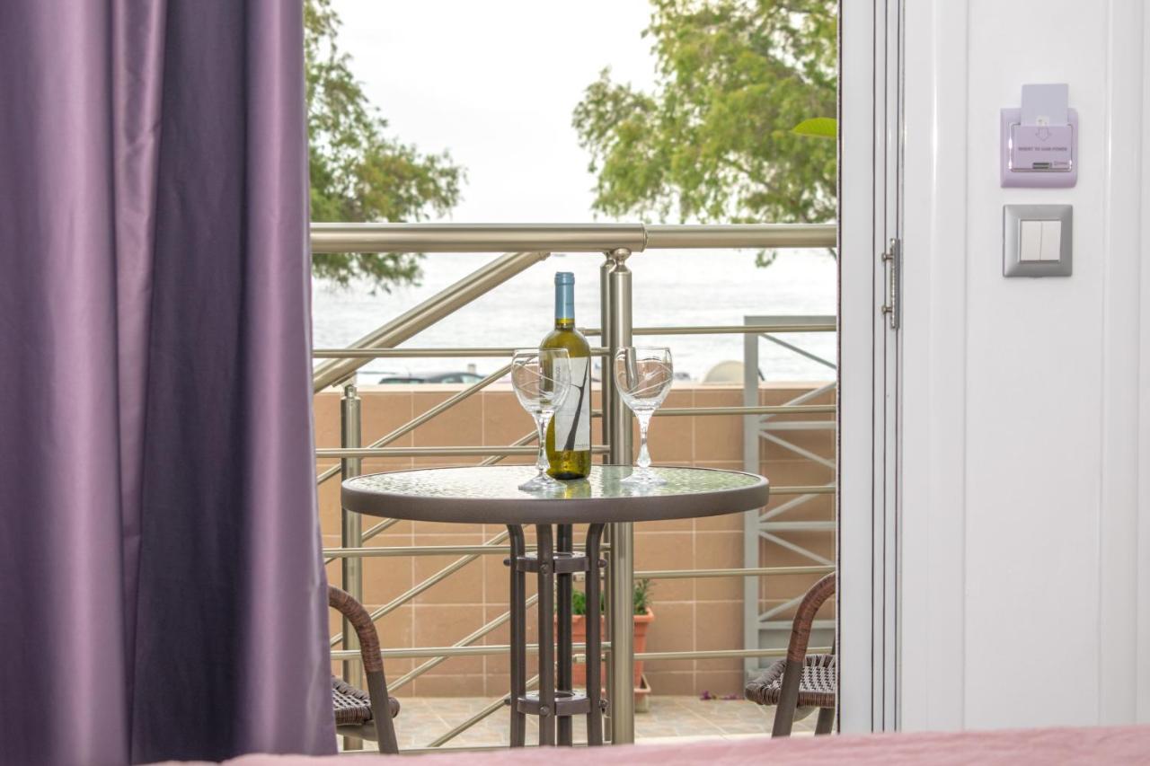 Red Hibiscus Stegna Guest House Archangelos  Bagian luar foto