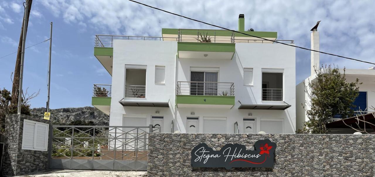 Red Hibiscus Stegna Guest House Archangelos  Bagian luar foto