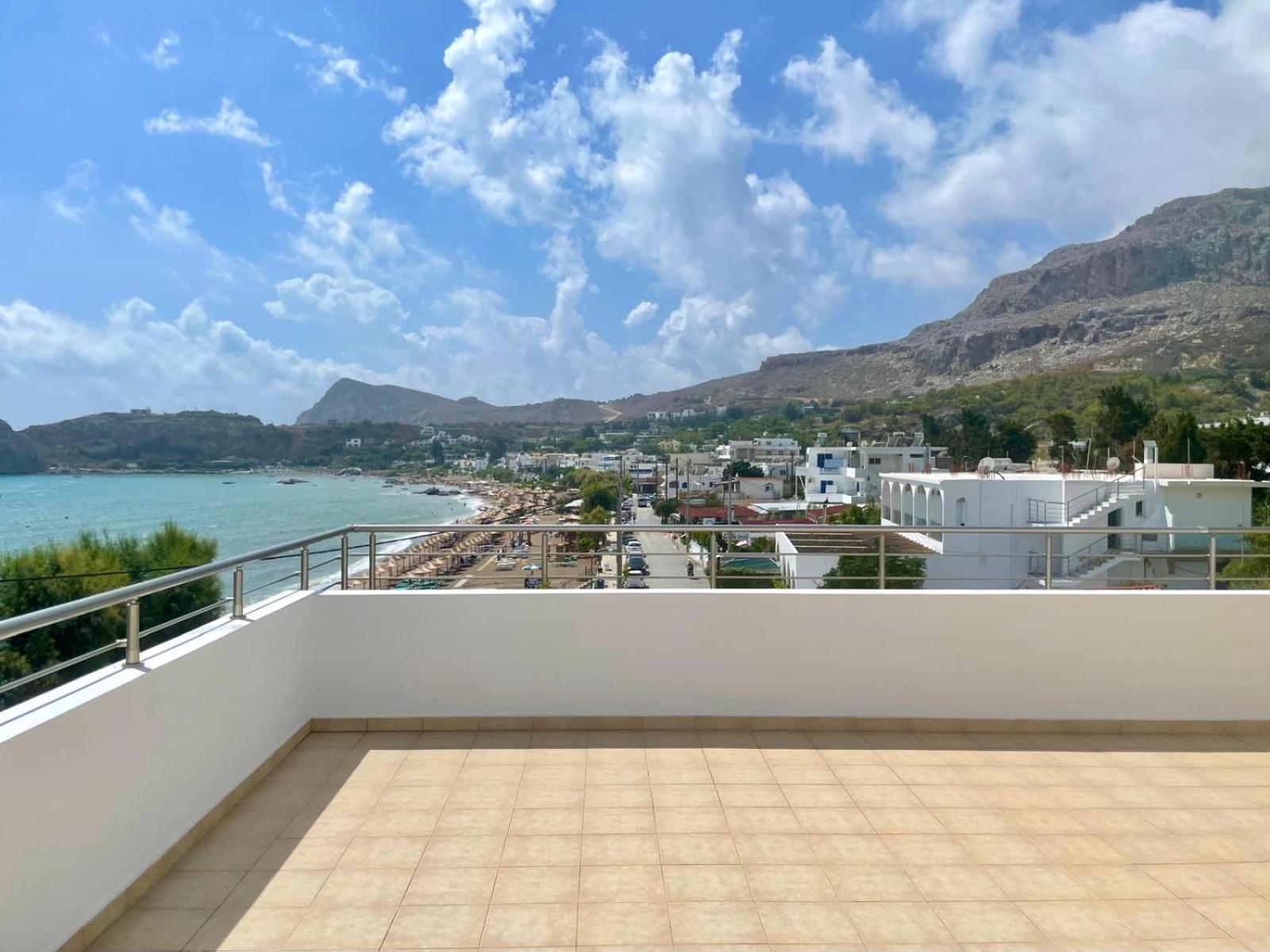 Red Hibiscus Stegna Guest House Archangelos  Bagian luar foto
