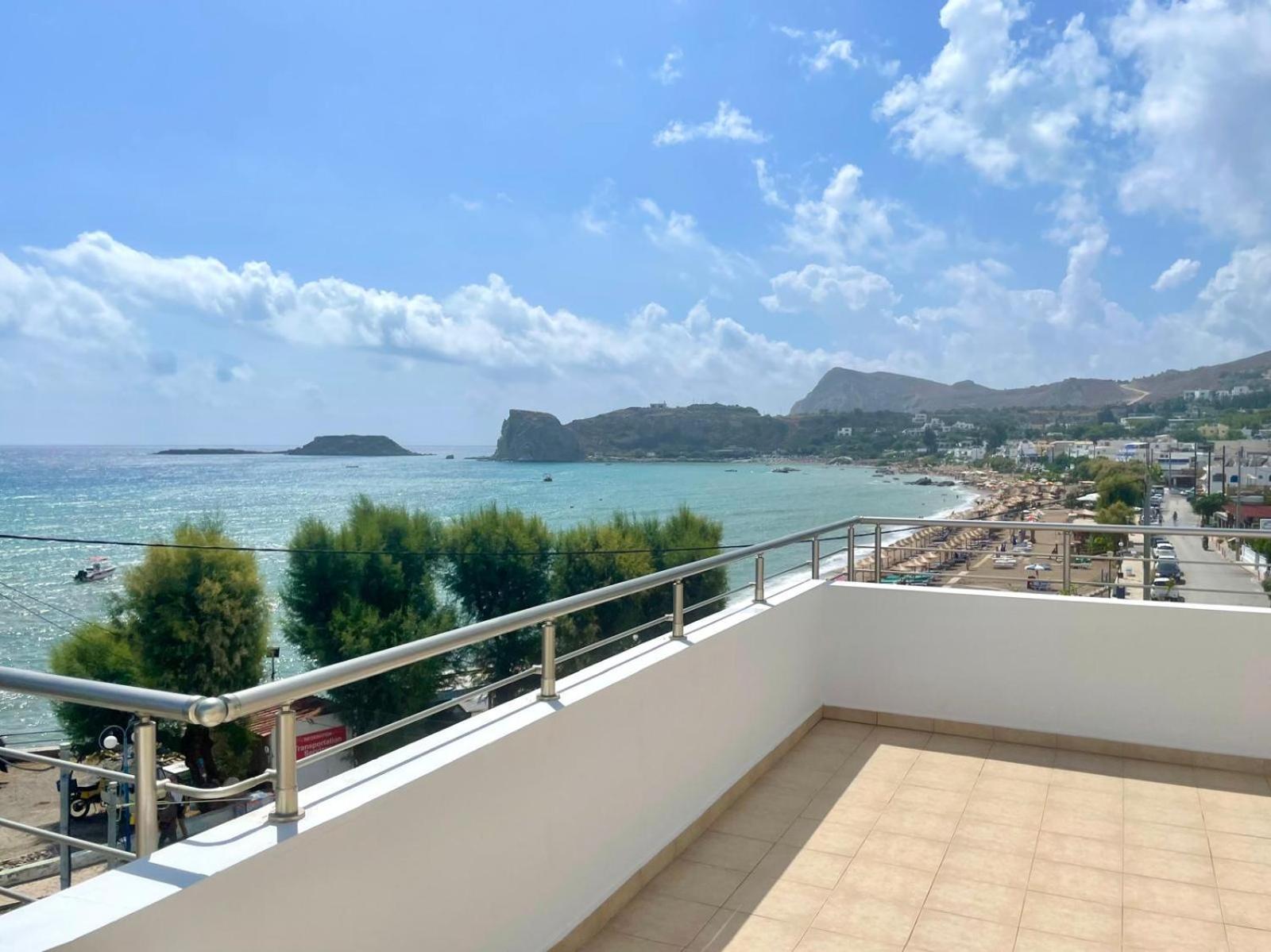 Red Hibiscus Stegna Guest House Archangelos  Bagian luar foto