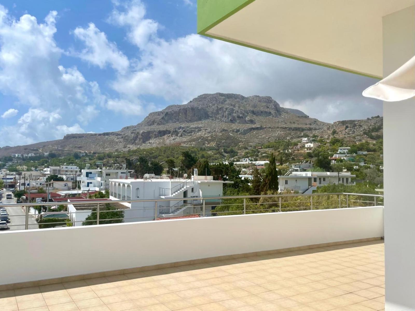 Red Hibiscus Stegna Guest House Archangelos  Bagian luar foto
